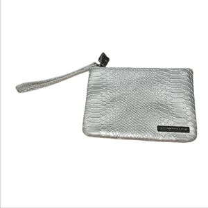 Rodan + Fields silver wristlet NWOT clean in and out. Pink inside. H5.5" x L7"